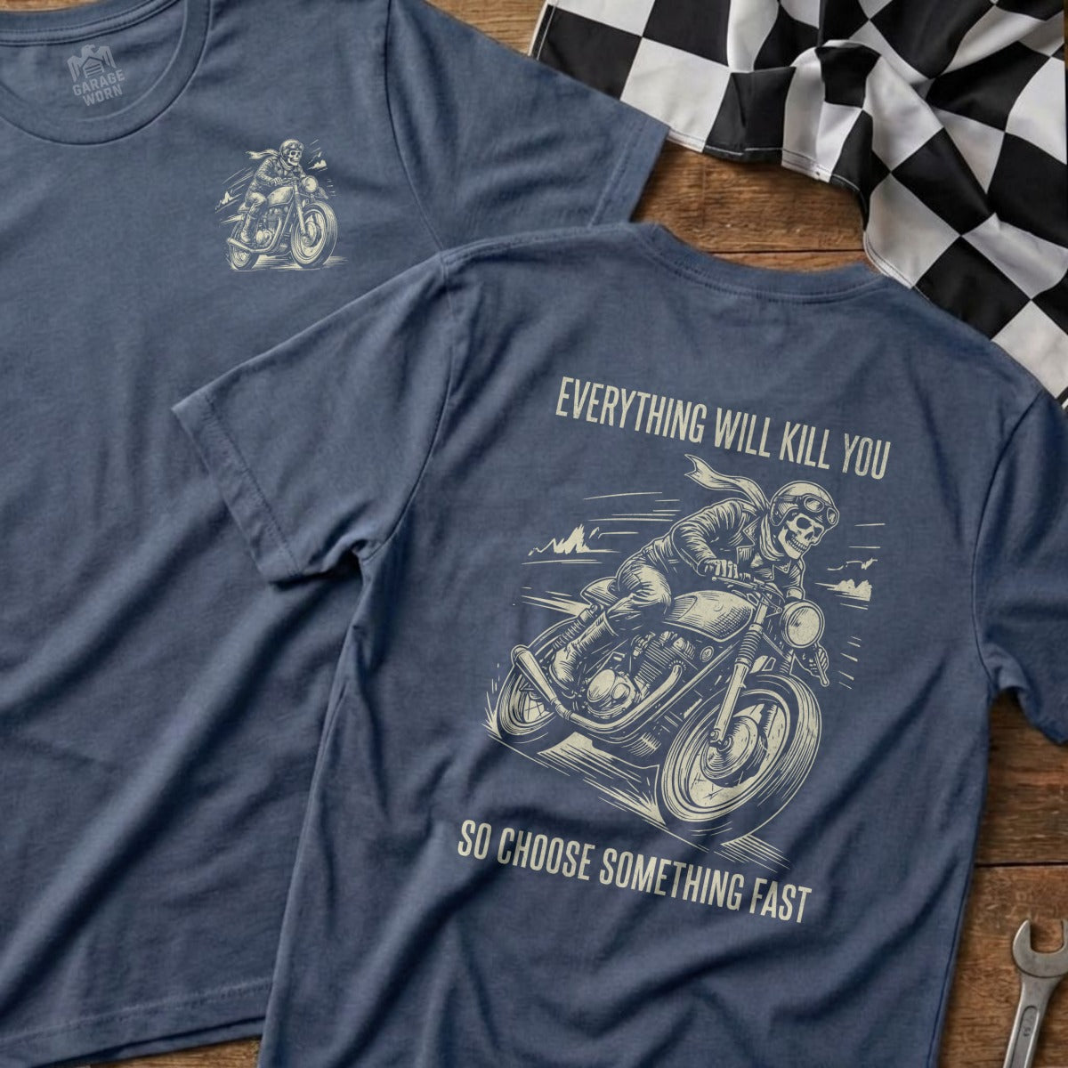 Blue t-shirt with skeleton biker graphic and text "Everything Will Kill You, So Choose Something Fast."