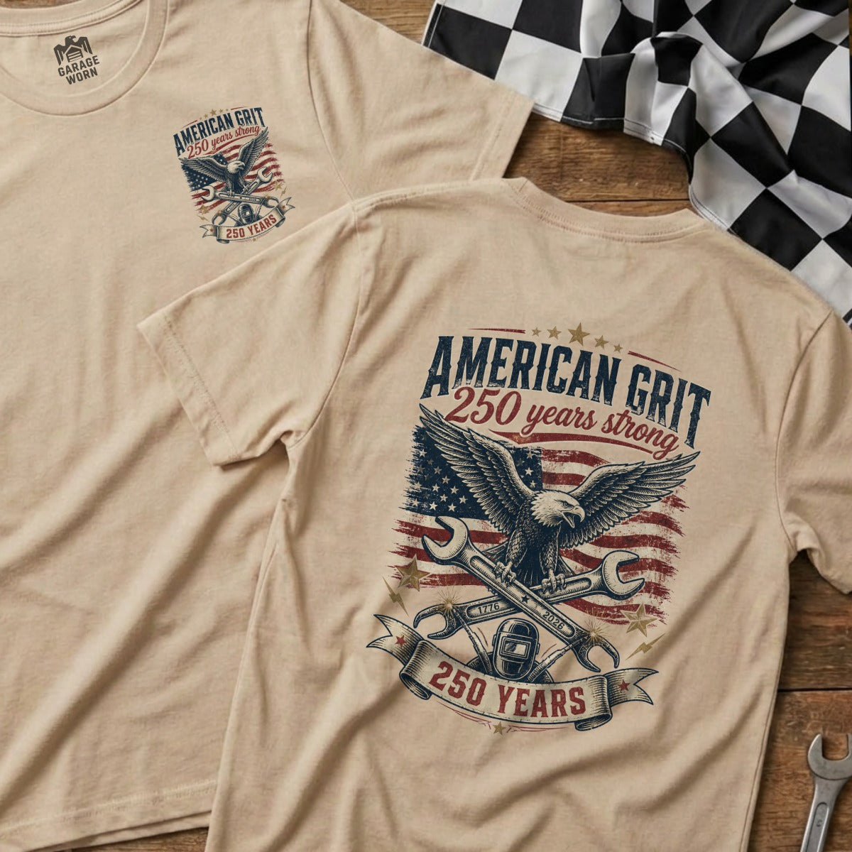 Tan t-shirt with "American Grit 250 Years Strong" eagle and wrenches graphic.