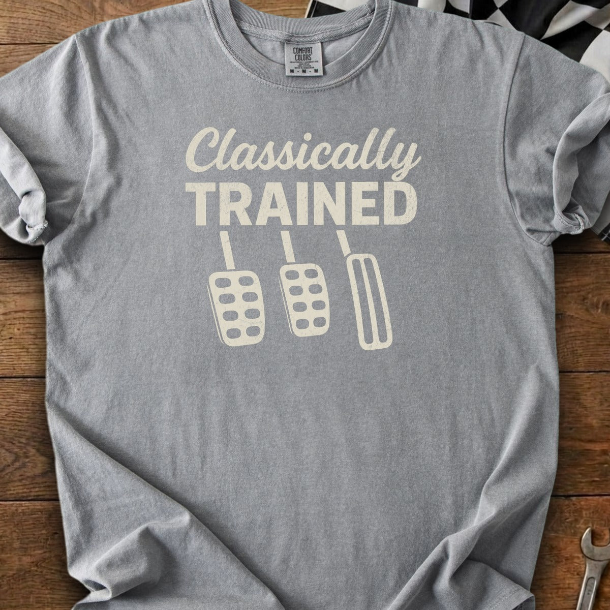 Grey t-shirt with "Classically TRAINED" text and three pedal graphics.