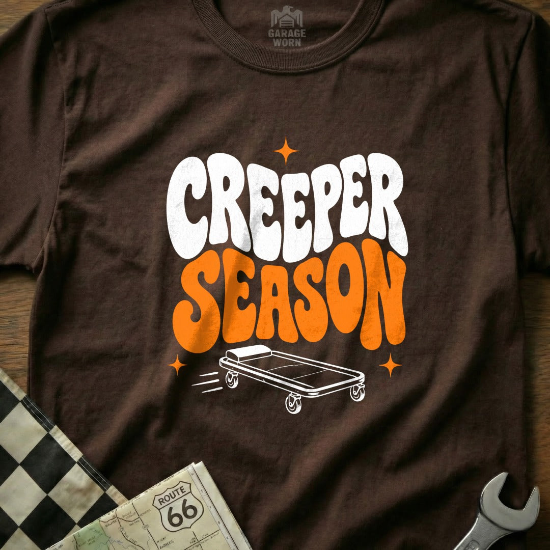 Brown t-shirt with "Creeper Season" text and a rolling creeper graphic.