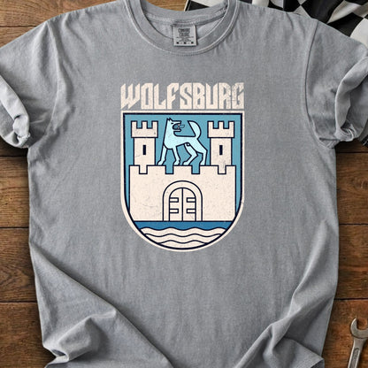 Grey t-shirt with Wolfsburg crest and text, featuring a wolf and castle.