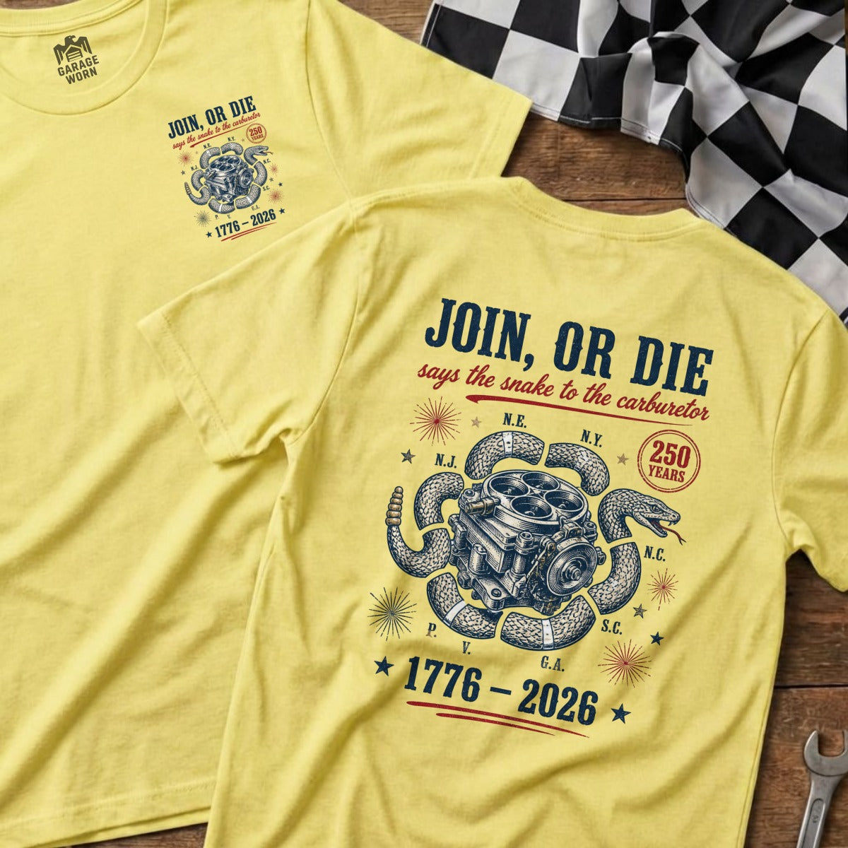 Yellow t-shirt with "Join, Or Die" text, snake coiled around carburetor, and "1776-2026".
