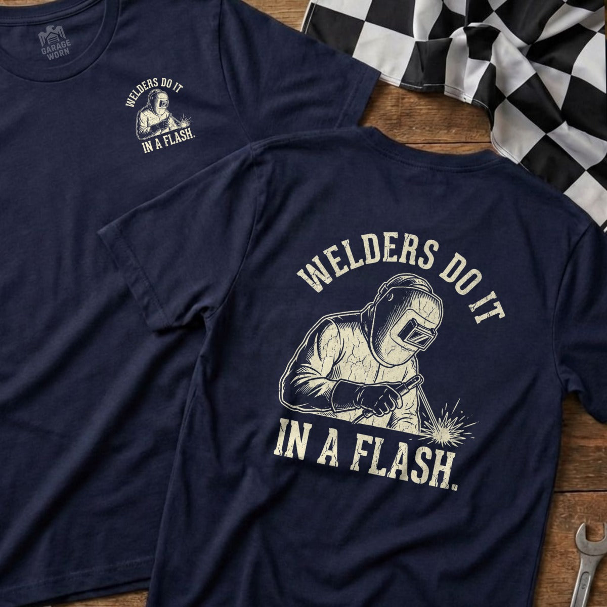 Navy t-shirt with "Welders Do It In A Flash" and welder graphic.