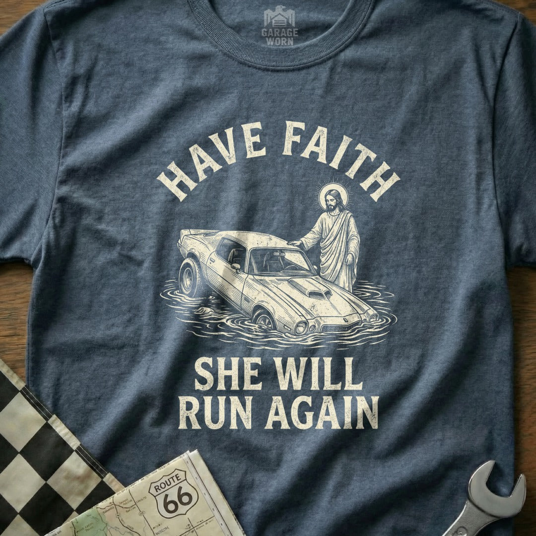 Jesus with hand on classic car submerged in water, text says "Have Faith She Will Run Again".