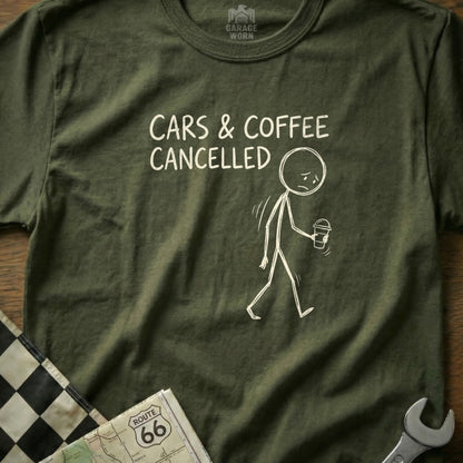 Olive green t-shirt with graphic of stick figure holding coffee cup, text "CARS & COFFEE CANCELLED".