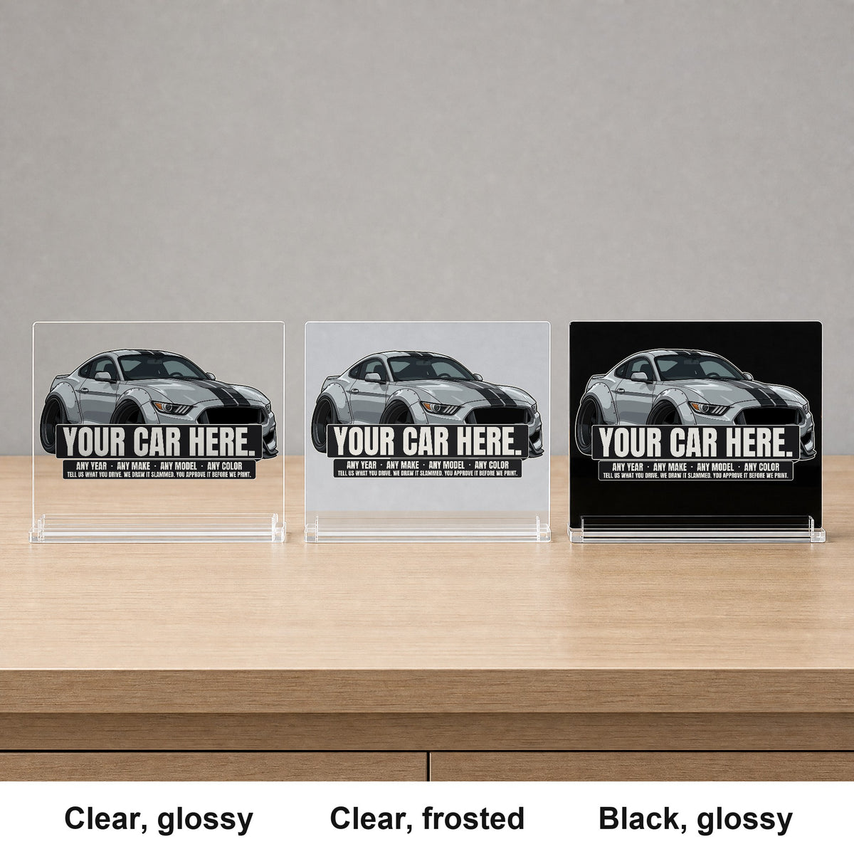 The three desk sign finishes side by side: clear glossy, clear frosted, black glossy