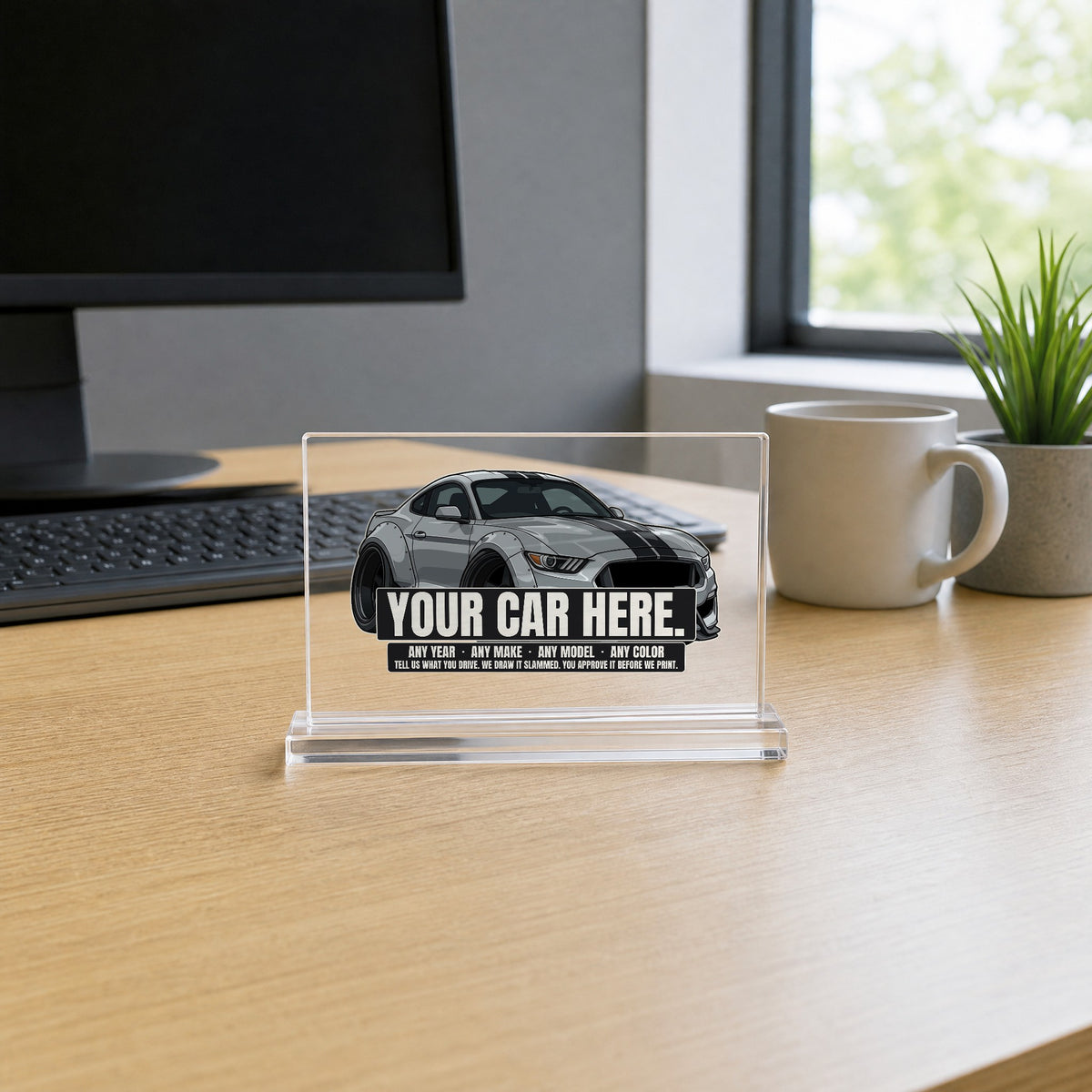 Your car here - clear glossy acrylic desk sign on an office desk