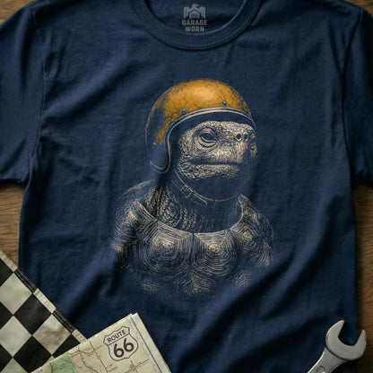 Turtle wearing a yellow helmet and collar on a navy blue shirt.