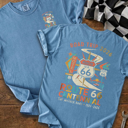Blue t-shirt with Route 66 Centennial graphics and "Road Trip 2026" text.
