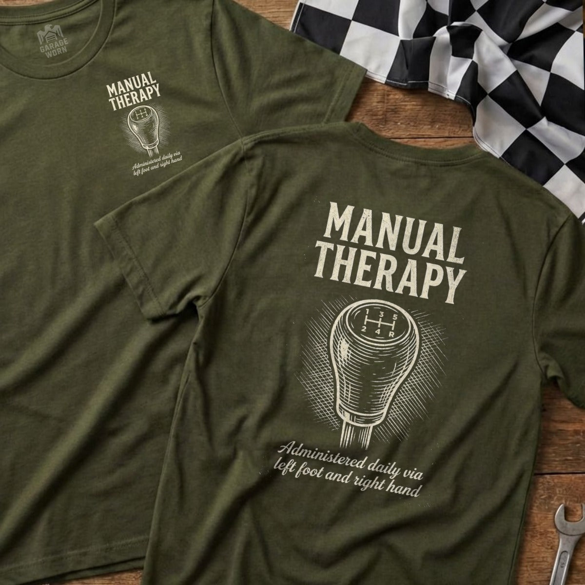 Green t-shirt with "Manual Therapy" and gear shift graphic.