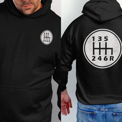 Black hoodie with a circular six-speed manual transmission shifter graphic on the back.