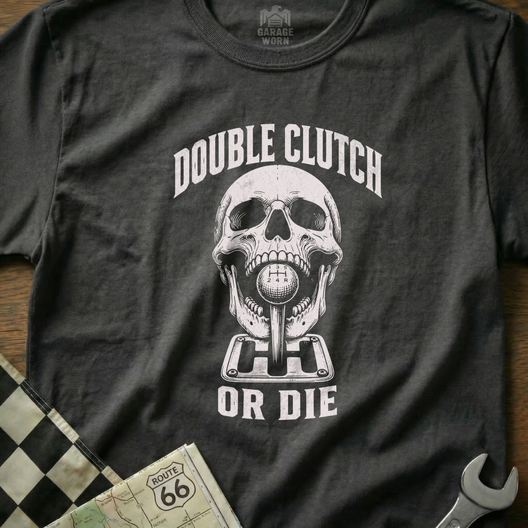 T-shirt with skull gripping a gear shifter, text "Double Clutch Or Die."