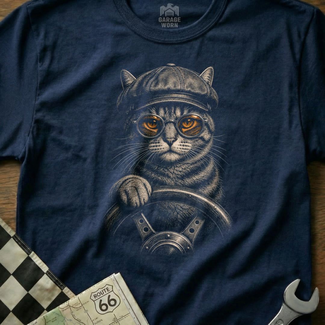 T-shirt with a tabby cat wearing a hat and glasses driving a car.