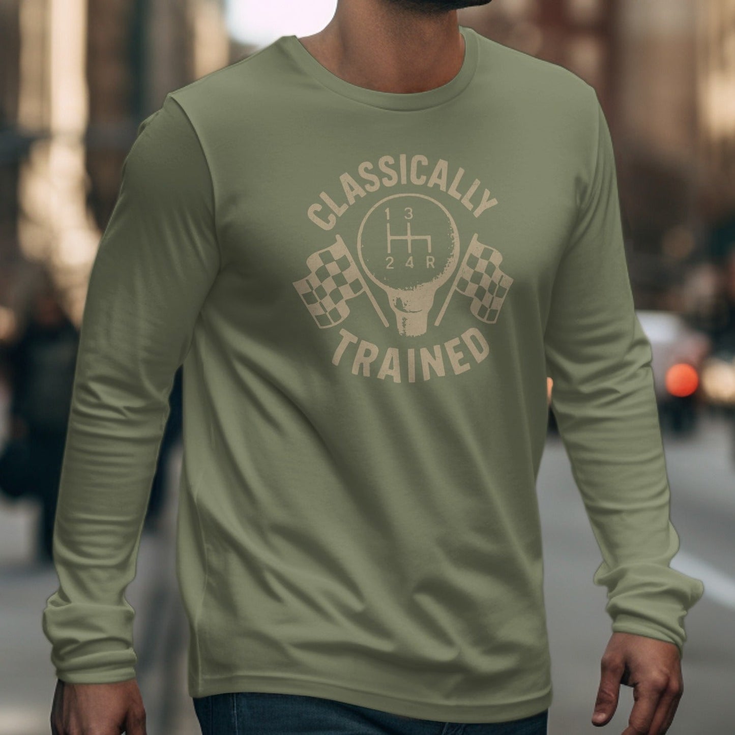 Olive long sleeve shirt with "Classically Trained" text, gear shift, and checkered flags graphic.