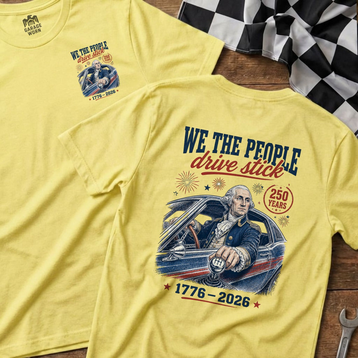 Yellow shirts feature George Washington driving a car with "We the People drive stick" text.