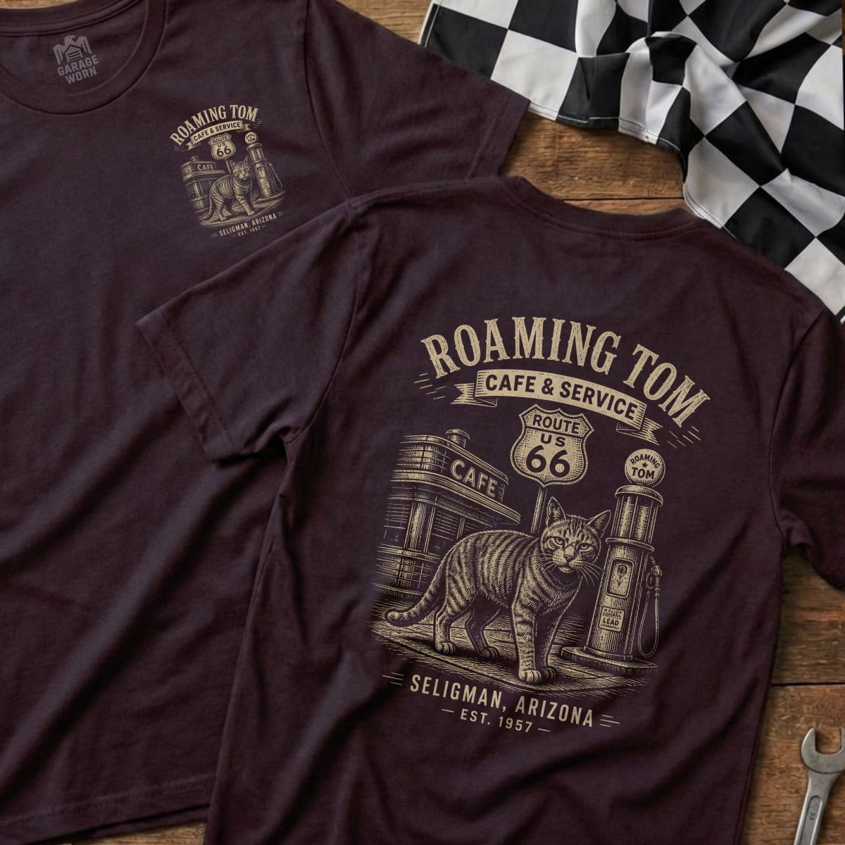 Burgundy t-shirt with "Roaming Tom Cafe & Service Seligman, Arizona" graphic and a cat.