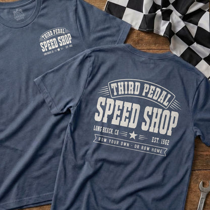 Blue t-shirt with "Third Pedal Speed Shop" text on back.