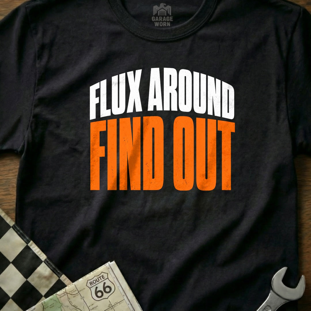 Black t-shirt with white text "FLUX AROUND" and orange text "FIND OUT".