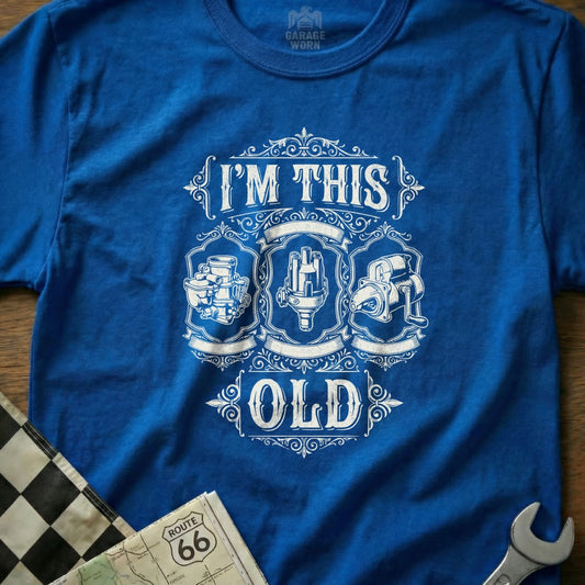 Blue t-shirt with "I'm This Old" and vintage engine parts graphic.