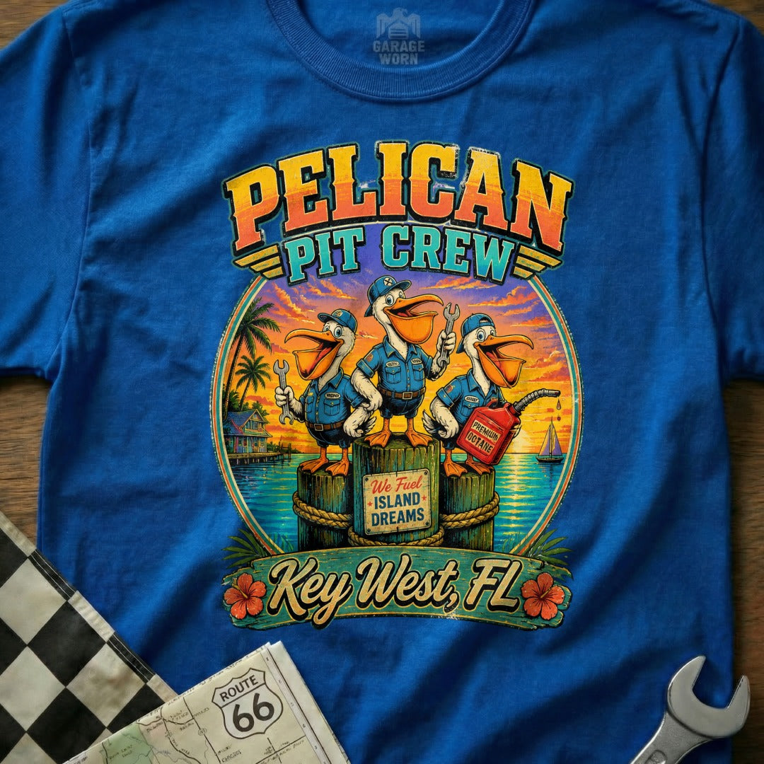 Pelican Pit Crew t-shirt with three pelicans holding tools and fuel, Key West, FL.