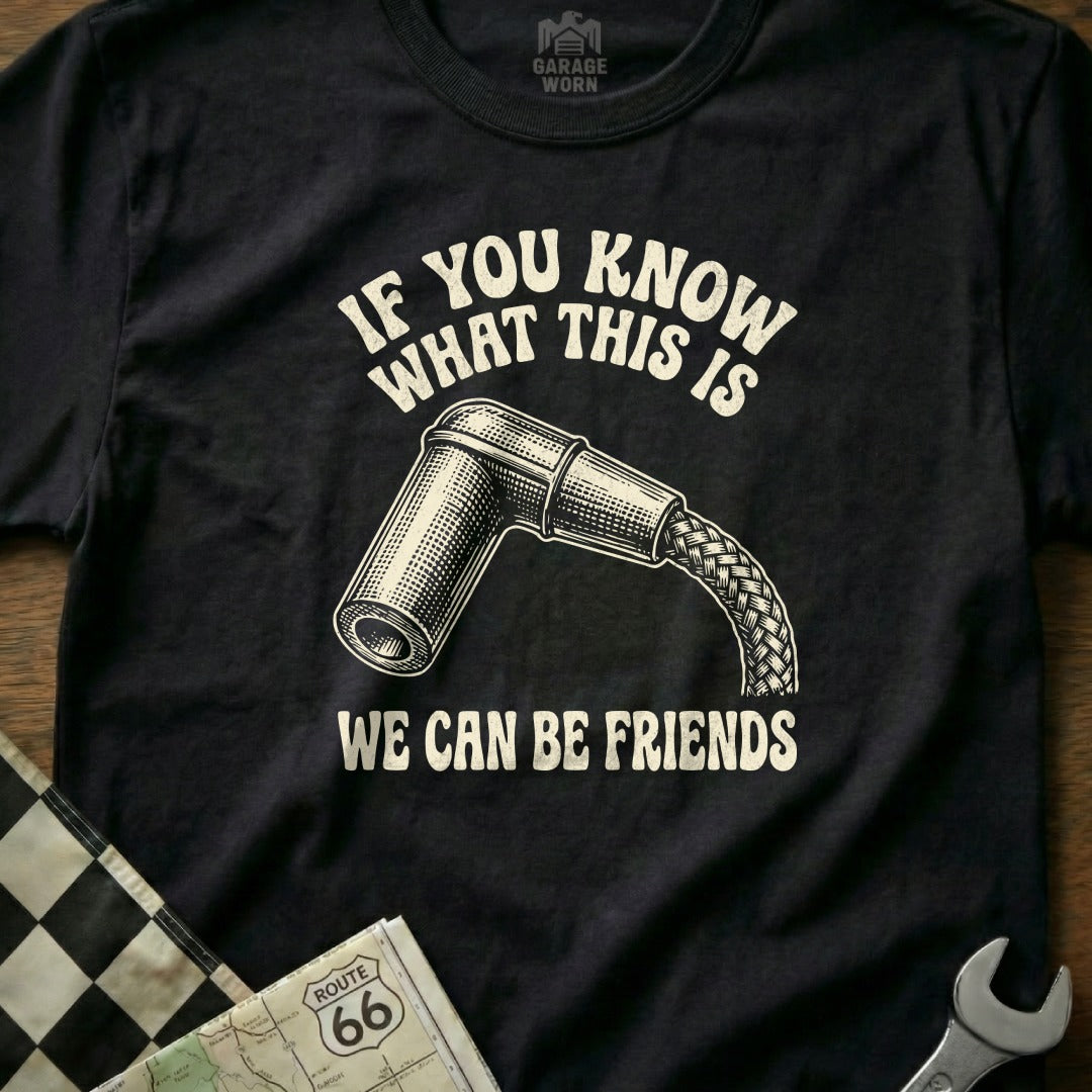 Black t-shirt with a spark plug and text: "If you know what this is, we can be friends."