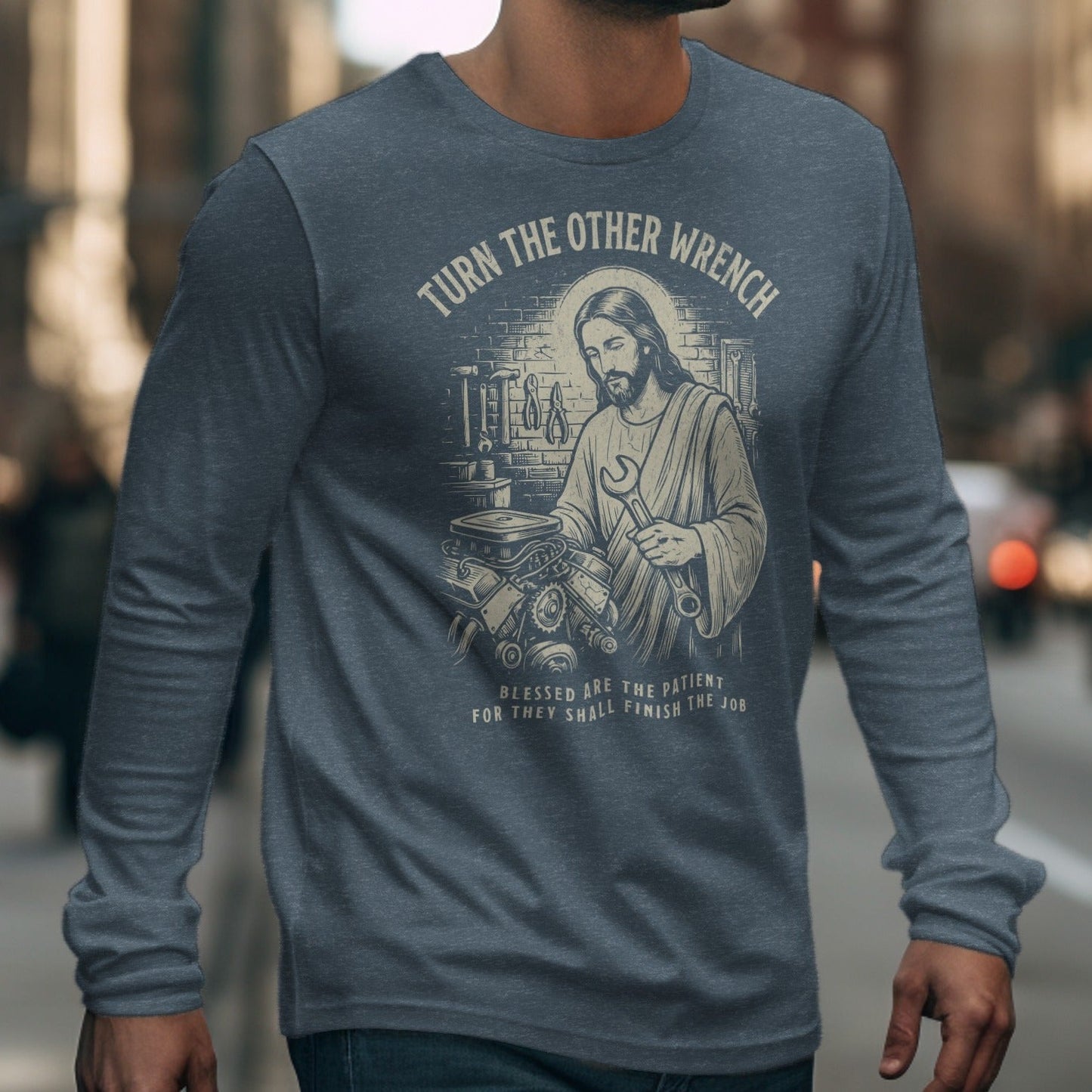 Jesus holding a wrench with "Turn the other wrench" and mechanic imagery.
