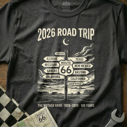 Dark t-shirt with "2026 Road Trip" and Route 66 signpost art.
