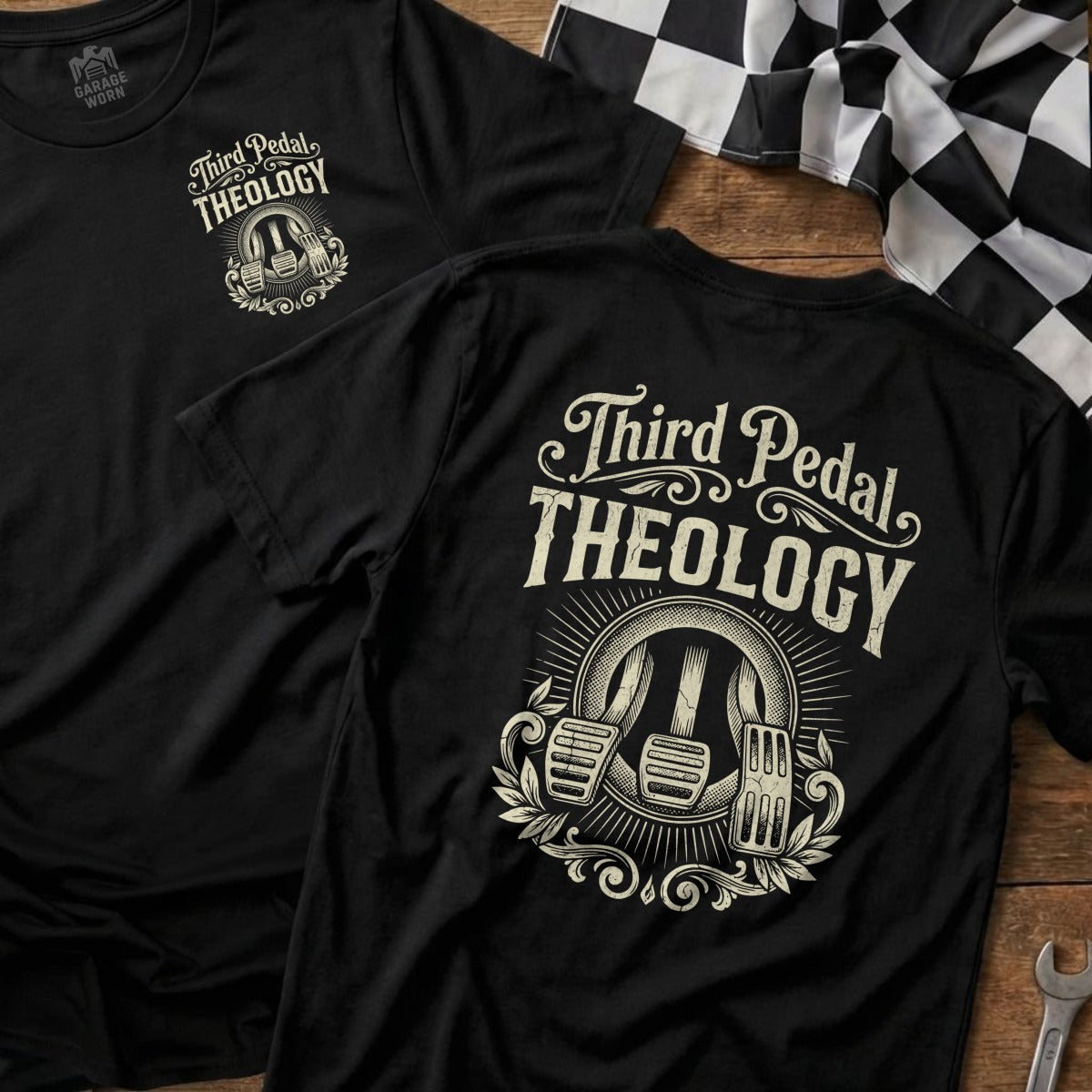 Black t-shirt with "Third Pedal Theology" text and pedal graphic.