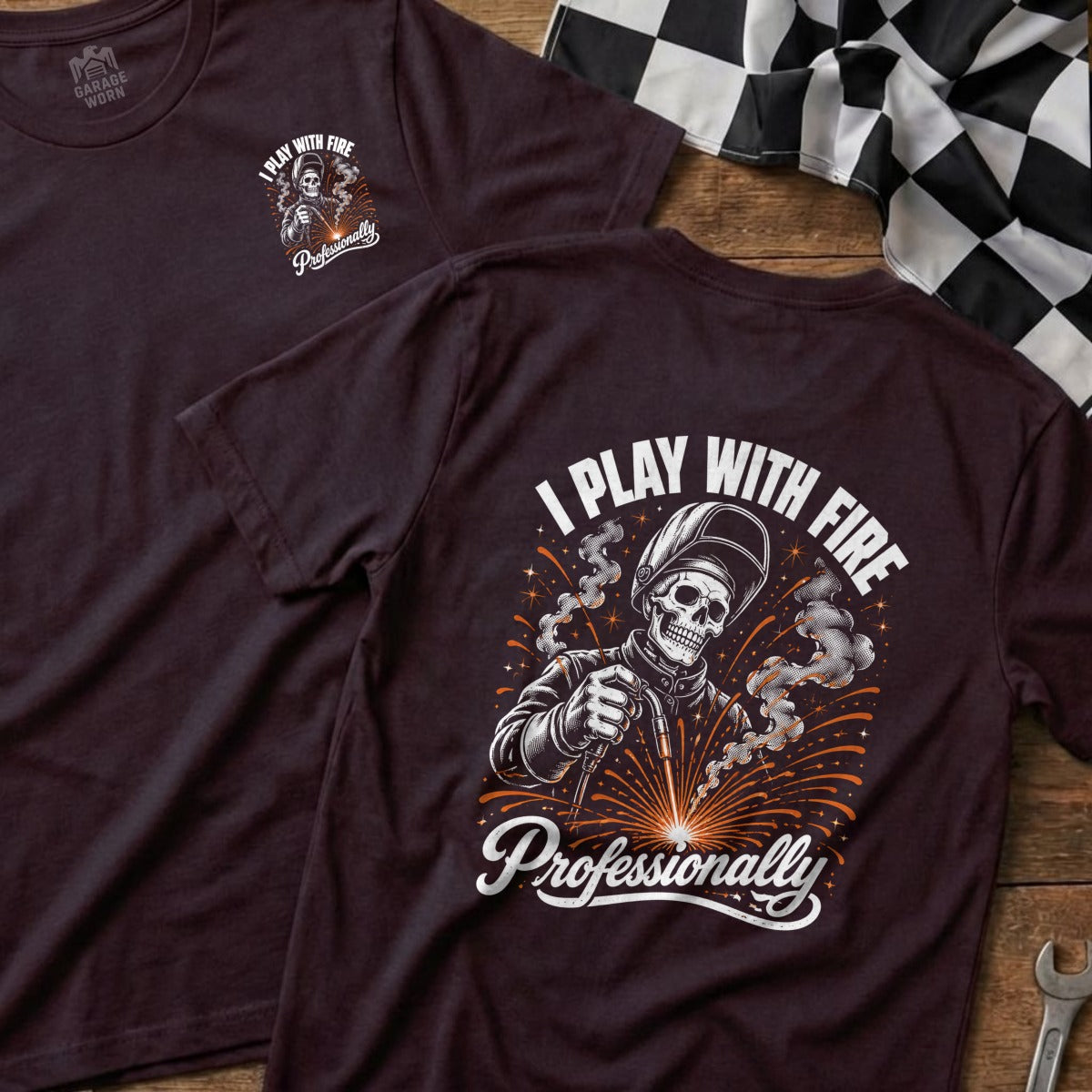 T-shirt with skeleton welder graphic and text "I PLAY WITH FIRE Professionally".