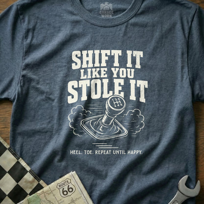 Heathered t-shirt with text "Shift it like you stole it" and gear shifter illustration.