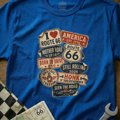 Blue t-shirt with Route 66 and vintage road sign graphics.