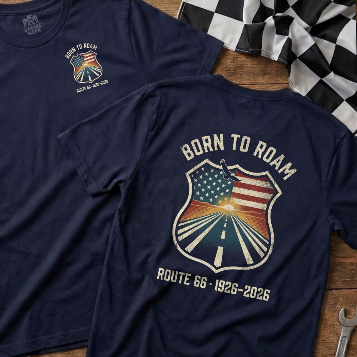 Navy t-shirt with "Born to Roam" Route 66 shield graphic.
