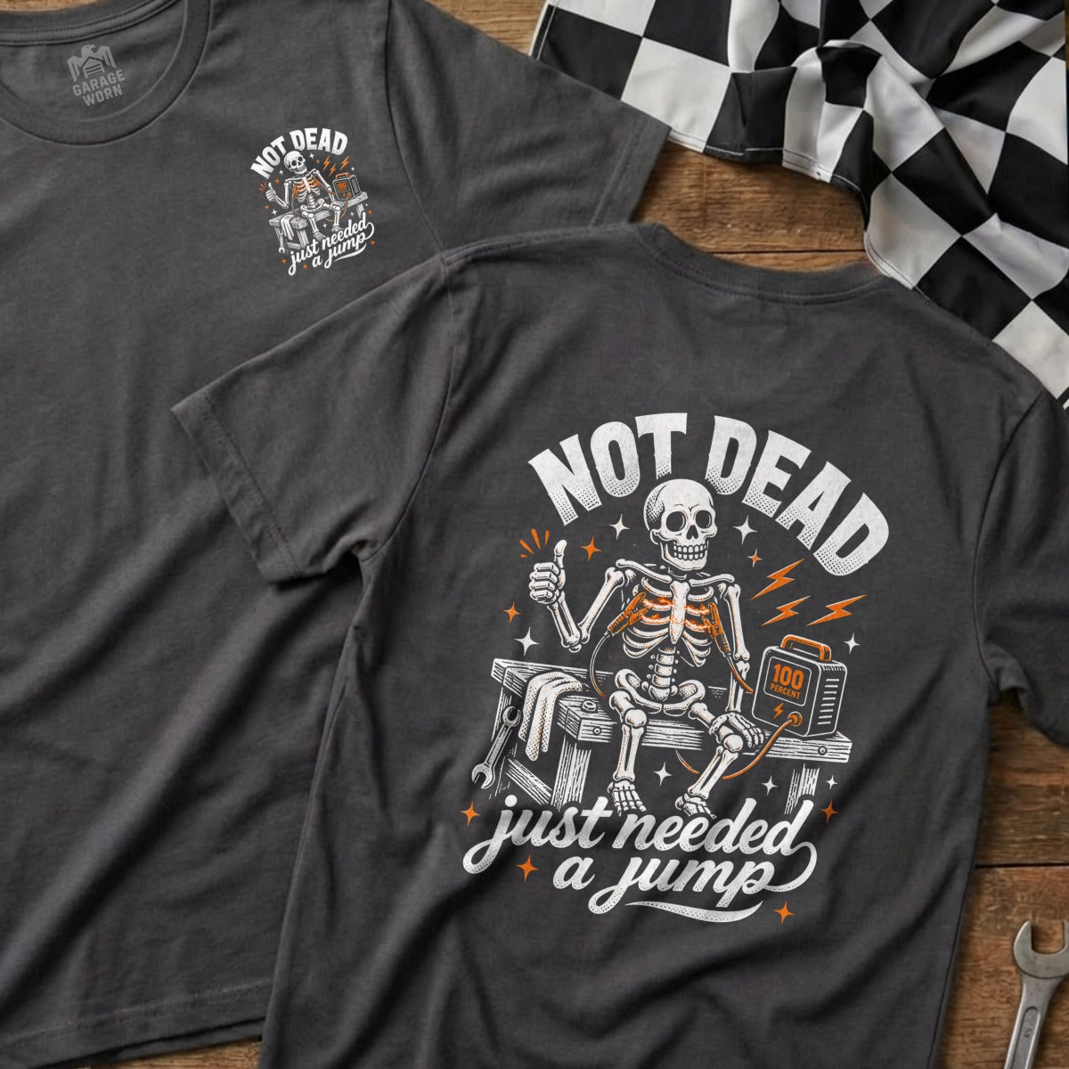 Skeleton with jumper cables and "Not Dead, Just Needed a Jump" text.