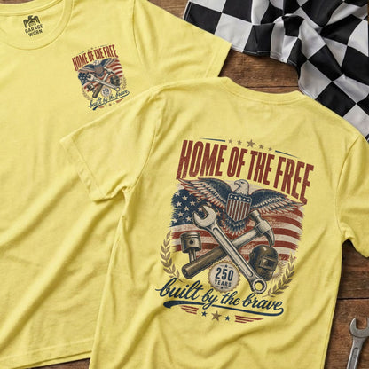 Yellow t-shirt with "Home of the Free" design featuring an eagle and tools.