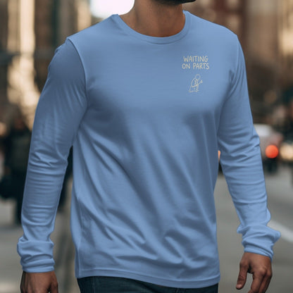 Light blue long-sleeve shirt with "WAITING ON PARTS" text and a silhouette graphic.