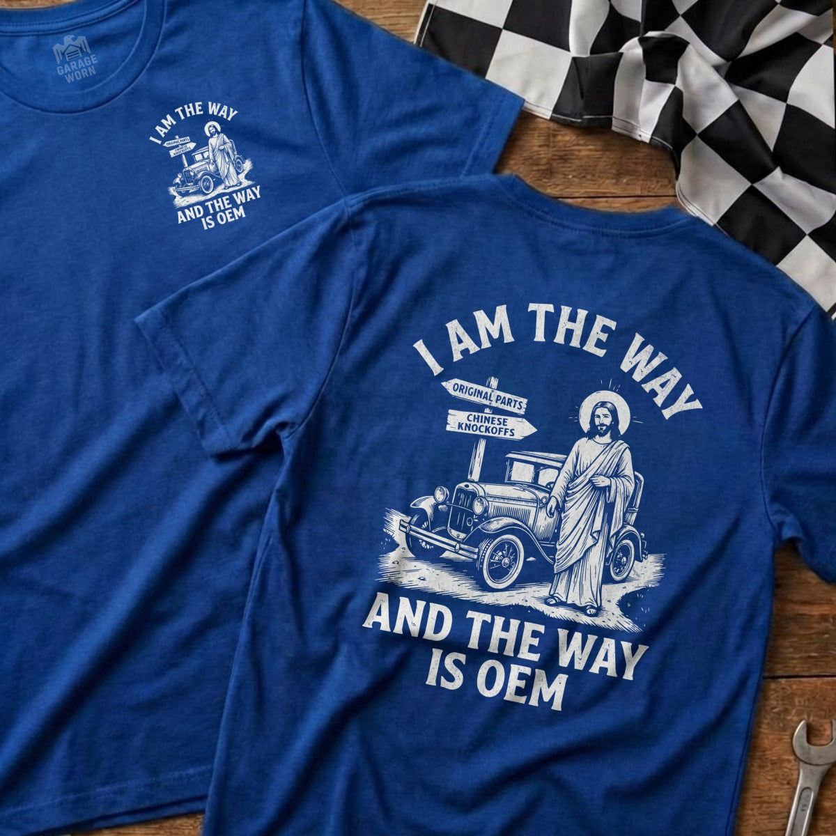Blue t-shirt with Jesus and car illustration and "I Am The Way Is Oem" text.