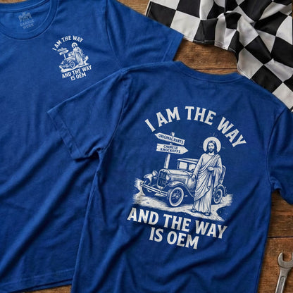 Blue t-shirt with Jesus and car illustration and "I Am The Way Is Oem" text.