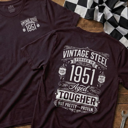 Maroon t-shirt with "Vintage Steel 1951 Aged. Tougher Not Pretty-Proven." graphic.