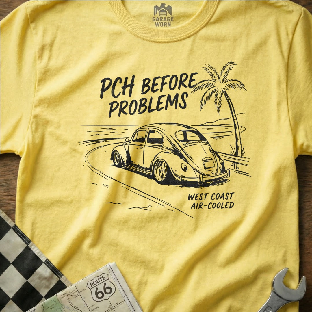 Yellow t-shirt with "PCH BEFORE PROBLEMS" and a vintage Beetle on a road.