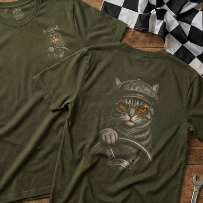 T-shirt with a cat wearing a hat and goggles driving a car.