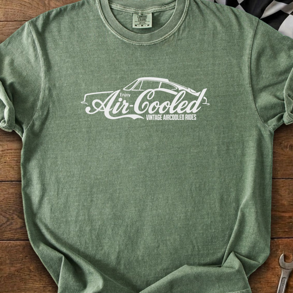 Green t-shirt with white graphic featuring a car and "Enjoy Air-Cooled Vintage Aircooled Rides" text.