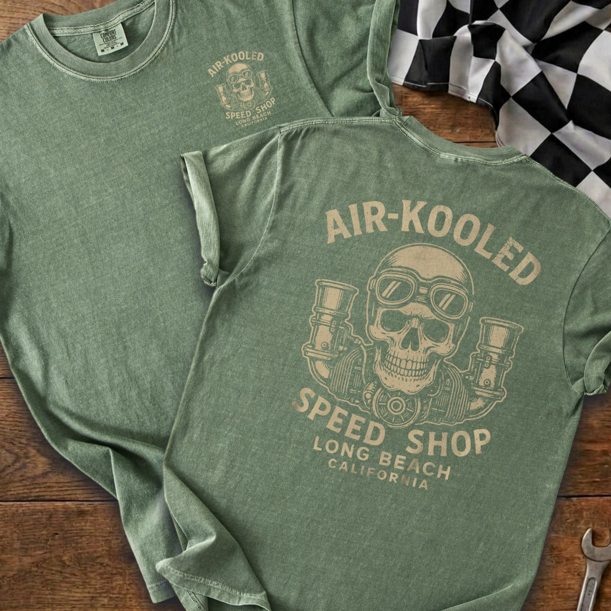 Green t-shirt with skull, goggles, and "Air-Kooled Speed Shop Long Beach California" graphic.