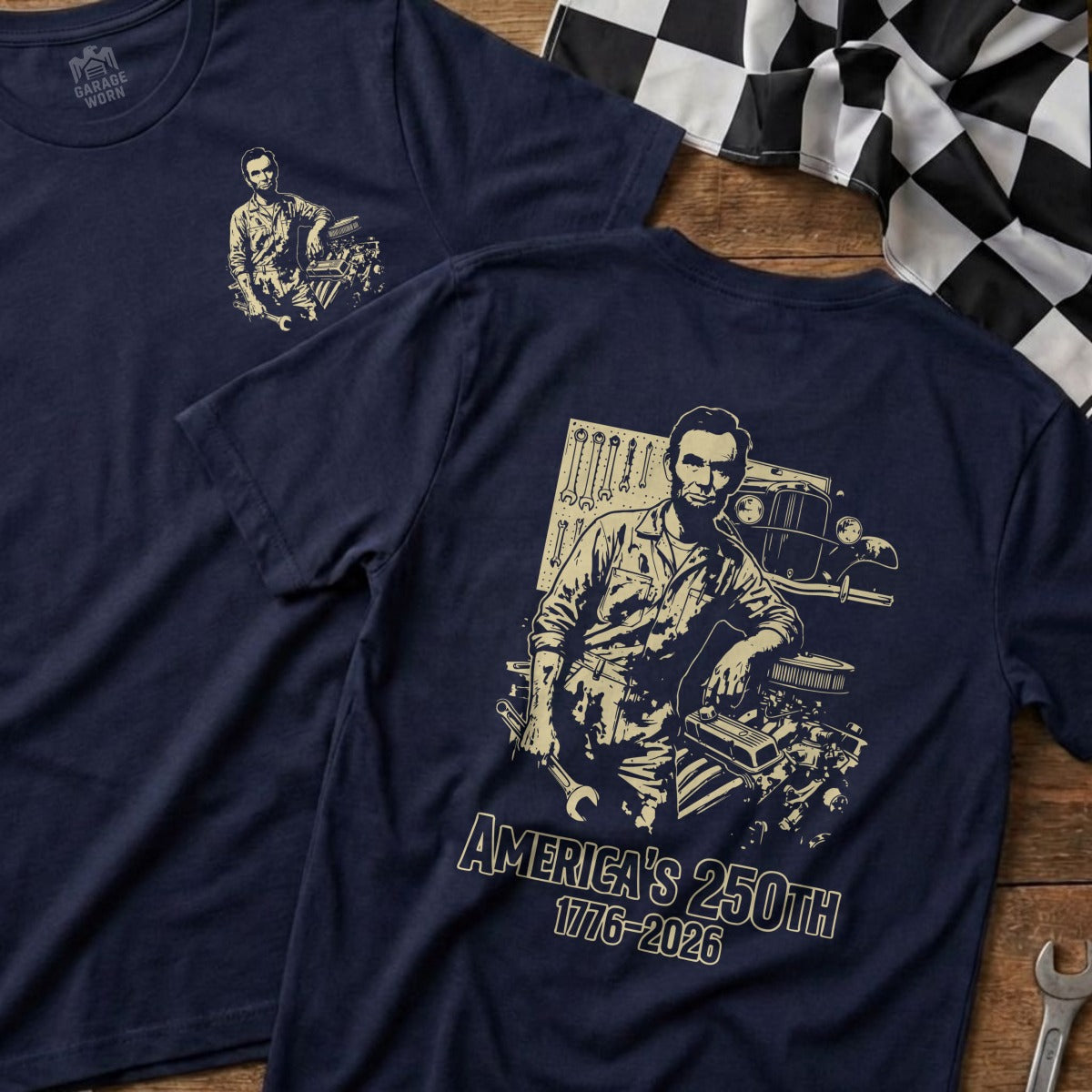 Navy t-shirt with Abraham Lincoln graphic and "AMERICA'S 250TH 1776-2026" text.