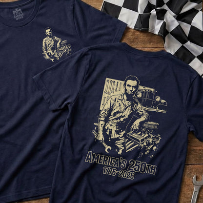 Navy t-shirt with Abraham Lincoln graphic and "AMERICA'S 250TH 1776-2026" text.