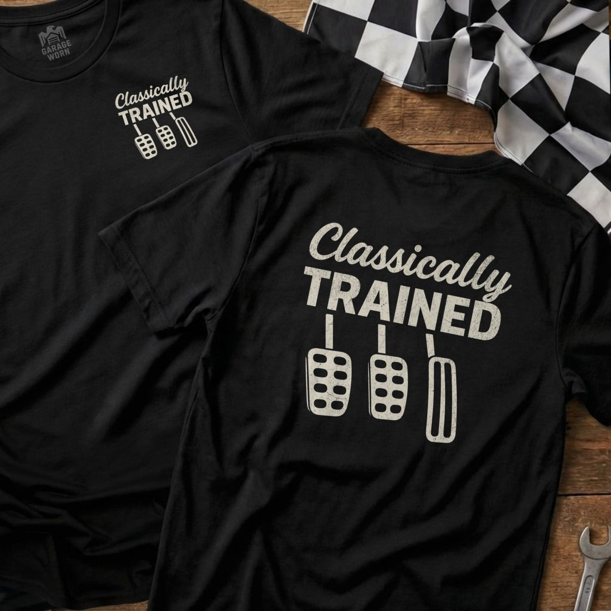 Black t-shirt with "Classically Trained" and three pedals design.