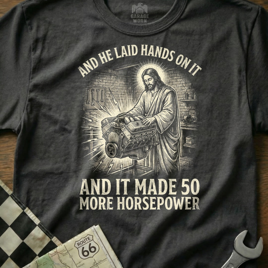 Jesus working on an engine, text reads "And he laid hands on it and it made 50 more horsepower".