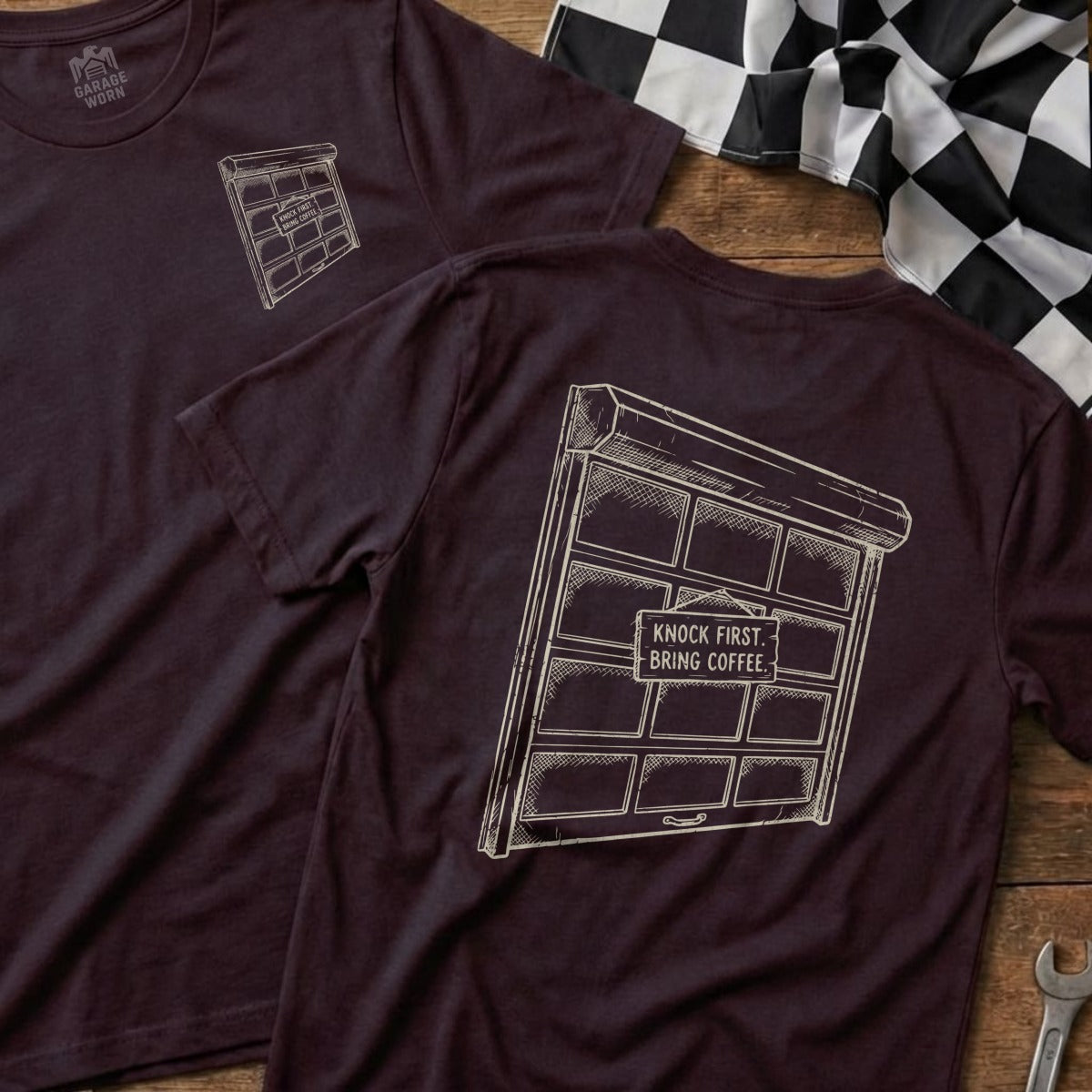 Burgundy t-shirt with garage door graphic and "Knock First. Bring Coffee." text.