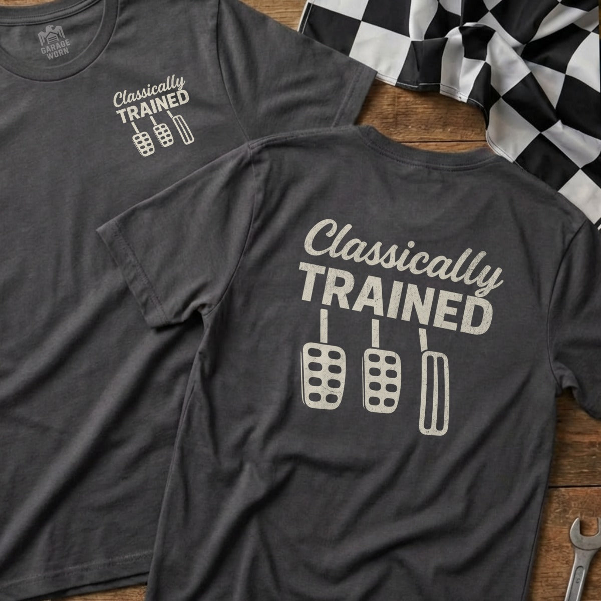 Dark gray t-shirt with white "Classically Trained" text and three pedal icons.
