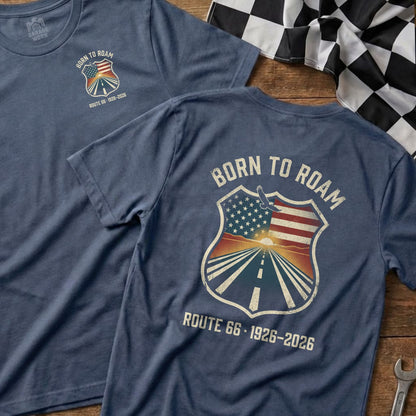 Blue t-shirt with "Born to Roam Route 66" design featuring a sunset over a road.