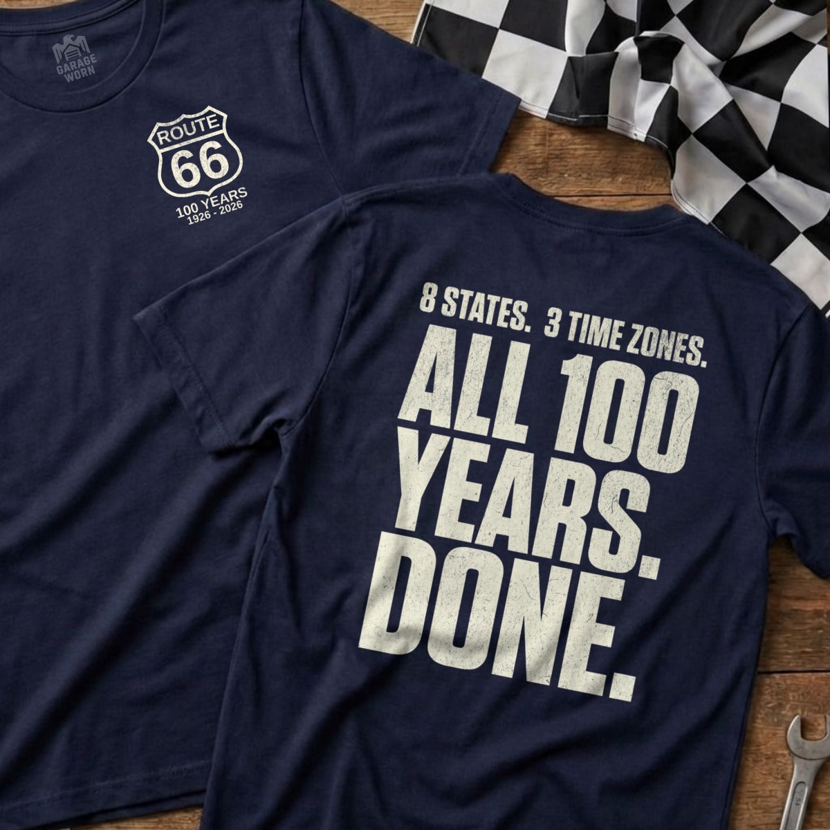Navy t-shirt with Route 66 logo and "100 YEARS. DONE." text.